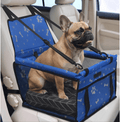 "Asiento de coche seguro para perros pequeños de Mimos y Pelos. Transportín de viaje azul con estampado de huellas, diseñado para proteger y dar comodidad a tu mascota durante los trayectos en auto."
